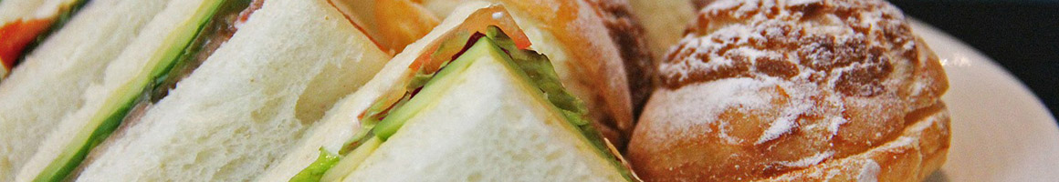 Eating Sandwich Chicken Salad at PDQ Cary restaurant in Cary, NC.